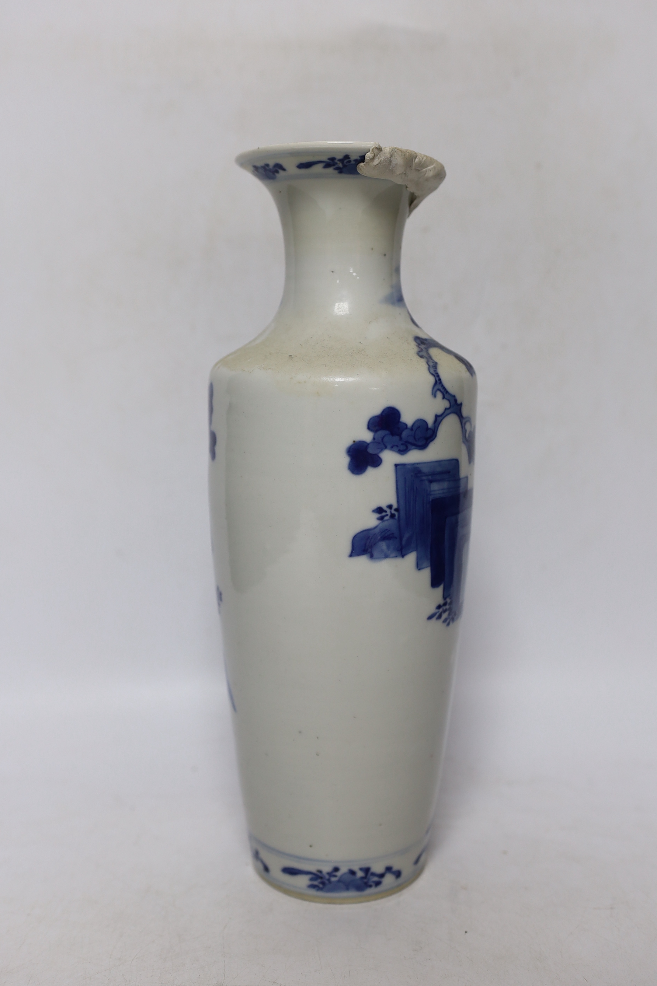 A group of Chinese blue and white dishes and plates and a damaged vase, 30cm